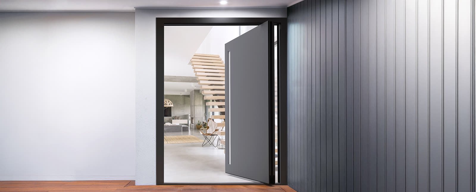 Porte d’entrée pivotante, système Cortizo Millennium Plus Pivot